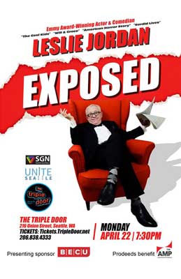 Leslie Jordan on a red armchair