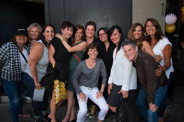 a group of women celebrating women's pride