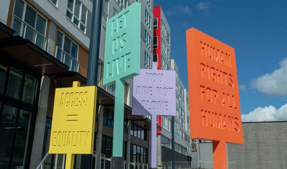 Photo of AIDS advocacy signs along The AIDS Memorial Pathway